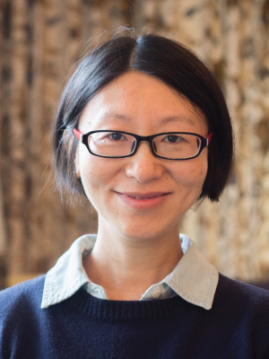 Liu Yang is a woman with glasses and short black hair